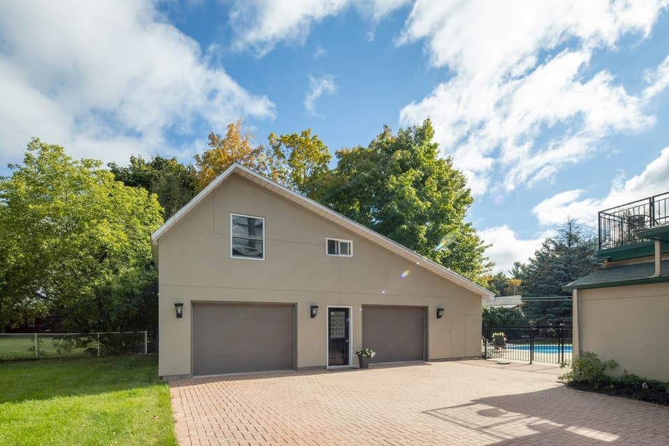 A coastal house with a garage door at ground level